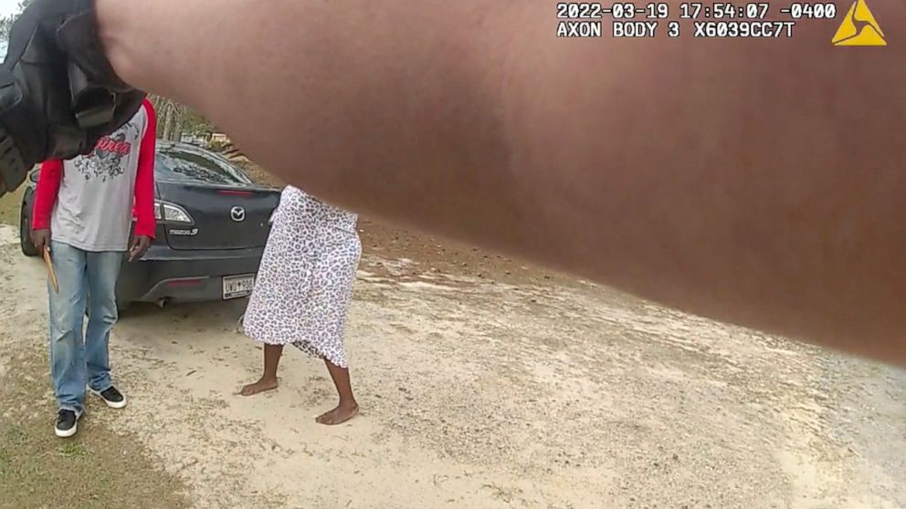 In this image from the body camera video of Richland County Sherrif's Deputy John Anderson, Irvin D. Moorer Charley, 34, holds a piece of wood as he walks towards Anderson, who is backpedaling, in Columbia, S.C. Moorer Charley was shot and killed aft