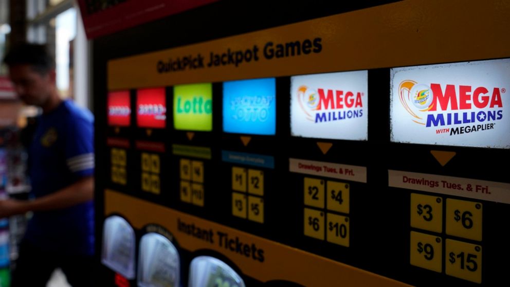 FILE - A lottery ticket vending machine in a convenience store, July 21, 2022, in Northbrook, Ill. The next Mega Millions drawing is Tuesday, July 25. (AP Photo/Nam Y. Huh, file)
