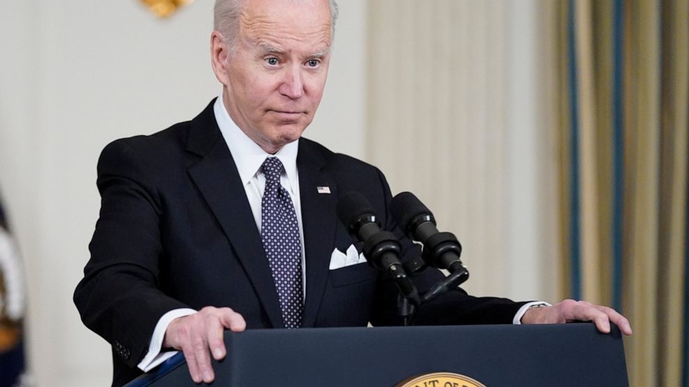 President Joe Biden listens to a question from a reporter about Russian President Vladimir Putin after speaking about his proposed budget for fiscal year 2023 in the State Dining Room of the White House, Monday, March 28, 2022, in Washington. (AP Pho