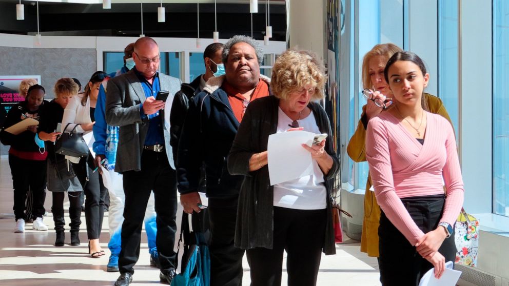 Applicants line up at a job fair at the Ocean Casino Resort in Atlantic City N.J. on April 11, 2022. Casinos across the country are trying to find additional workers as their businesses try to recover from the coronavirus pandemic, but are facing the