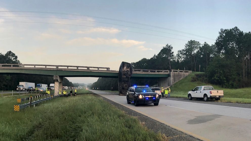 In this photo released by the Georgia Department of Transportation, the SR 86 bridge is inspected over Interstate 16 in Treutlen County, Ga., Thursday, July 15, 2021. The Interstate is shut down in both directions from Exit 71 to Exit 78 due to a lar