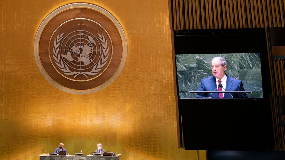 Syria's foreign minister Faisal Mekdad addresses the 76th Session of the United Nations General Assembly, Monday, Sept. 27, 2021, at U.N. headquarters. (AP Photo/John Minchillo, Pool)