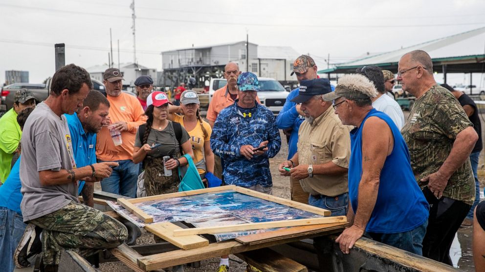 Determined volunteers still search for capsized ship missing