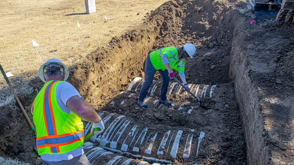 FILE - In this image provided by the city of Tulsa, Okla., crews work on an excavation at Oaklawn Cemetery searching for victims of the 1921 Tulsa Race Massacre on Oct. 26, 2022, in Tulsa. The latest search for remains of victims of the massacre ende