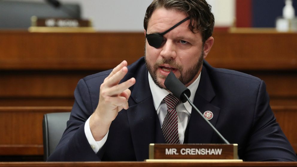 FILE - In this Sept. 17, 2020 file photo, Rep. Dan Crenshaw, R-Texas, questions witnesses during a House Committee on Homeland Security hearing on 'worldwide threats to the homeland' on Capitol Hill Washington. Crenshaw says he has undergone surgery 