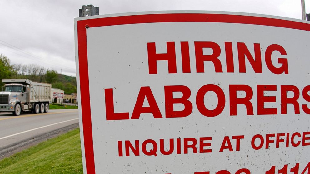 US jobless claims fall to 406,000, a new pandemic low