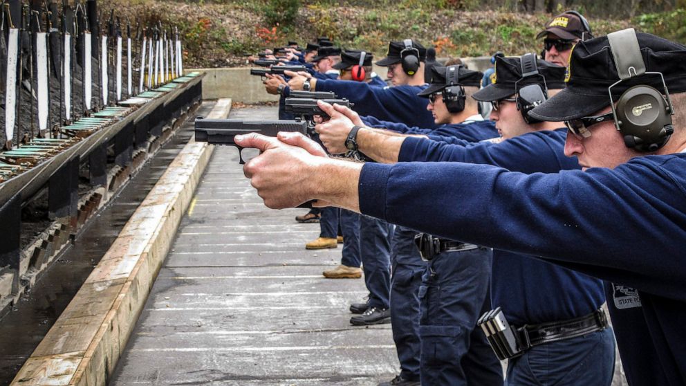 FILE - Connecticut state police recruits practice with their new .45-caliber Sig Sauer pistols during a "dry fire" exercise at the state police firing range in Simsbury, Conn., Oct. 24, 2012. Connecticut released data Thursday, Aug. 18, 2022, for the