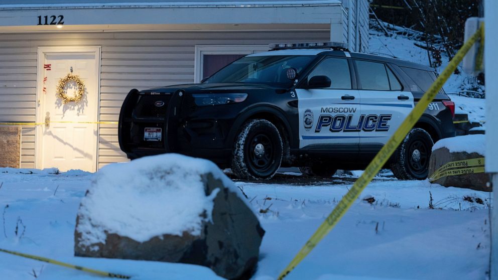 FILE - A Moscow police officer stands guard in his vehicle, Tuesday, Nov. 29, 2022, at the home where four University of Idaho students were found dead on Nov. 13, 2022 in Moscow, Idaho. Idaho Police investigating the stabbing deaths of the students 