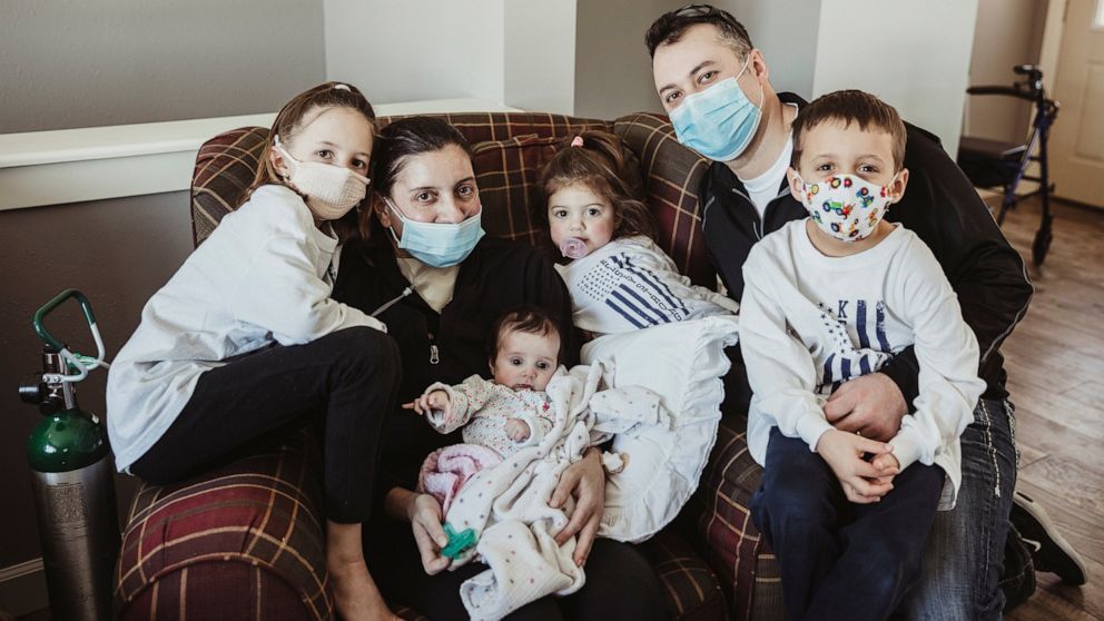  Wisconsin mother meets baby delivered during COVID-19 coma