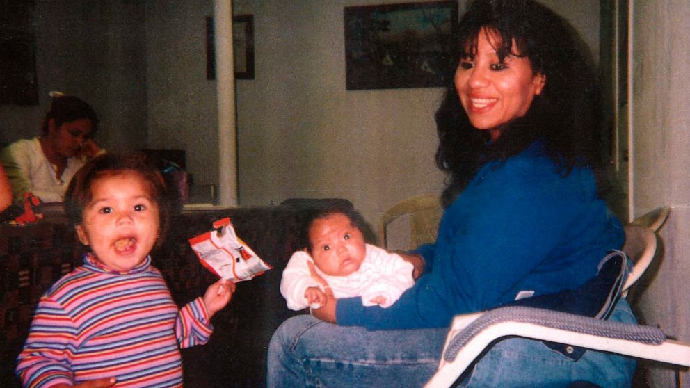 In this undated photograph, Texas death row inmate Melissa Lucio is holding her daughter Mariah, while one of her other daughters, Adriana, stands next to them. Lucio is set to be executed on April 27 for the 2007 death of Mariah. Prosecutors say Luc