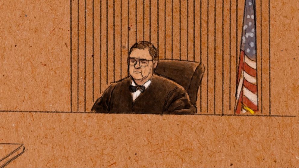In this courtroom sketch, U.S. District Judge Paul Magnuson presides over a pretrial hearing for three former Minneapolis officers charged in the death of George Floyd, in federal court on Tuesday, Jan.11, 2022 in St. Paul, Minn. Floyd died in May 20