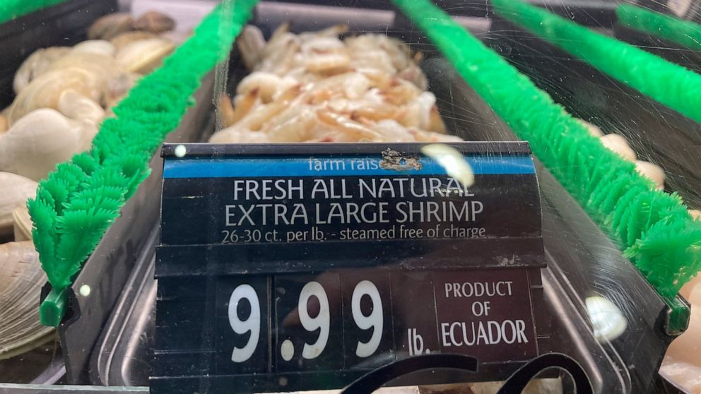 FILE - The price of shrimp is displayed at a market in Philadelphia, Thursday, June 16, 2022. (AP Photo/Matt Rourke, File)