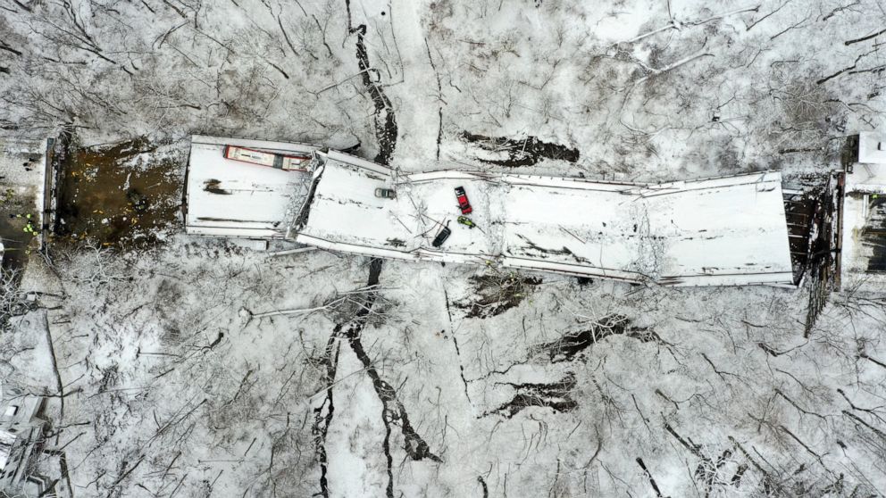 FILE—In this aerial image taken with a drone, vehicles rest on a bridge following its collapse, in this file photo from Jan. 28, 2022, in Pittsburgh. Video footage from a transit bus of the bridge collapse in Pittsburgh earlier this year shows one en