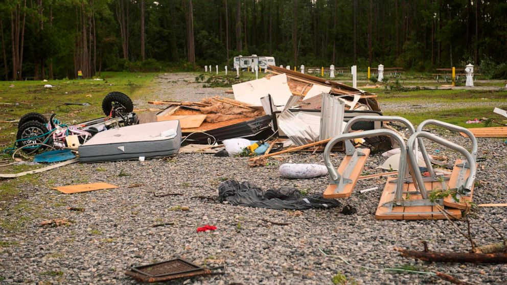 Debris covers the ground after a tornado struck Wednesday, the on-base RV park on Naval Submarine Base Kings Bay on Thursday, July 8, 2021 in Kings Gay, Ga. Severe weather from Tropical Storm Elsa spurred tornado warnings in Delaware and New Jersey e