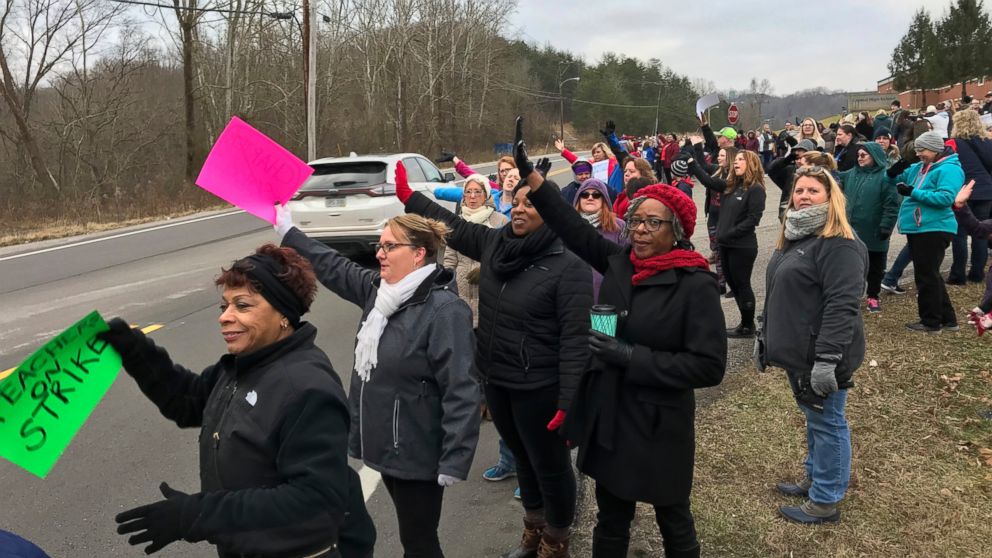 West Virginia teachers gathered at Capital High School in Charleston, WV. early Tuesday, Feb. 19, 2019, morning to protest the Omnibus Bill that is moving through the Legislature. (Kenny Kemp/Charleston Gazette-Mail via AP)