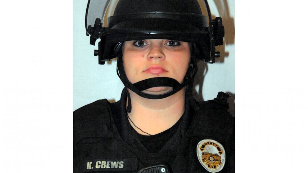This image provided by the Louisville Metro Police Department shows former Louisville Metro Police officer Katie R. Crews in riot gear following the fatal shooting of a barbecue restaurant owner on June 1, 2020, in Louisville, Ky. Crews pleaded guilt