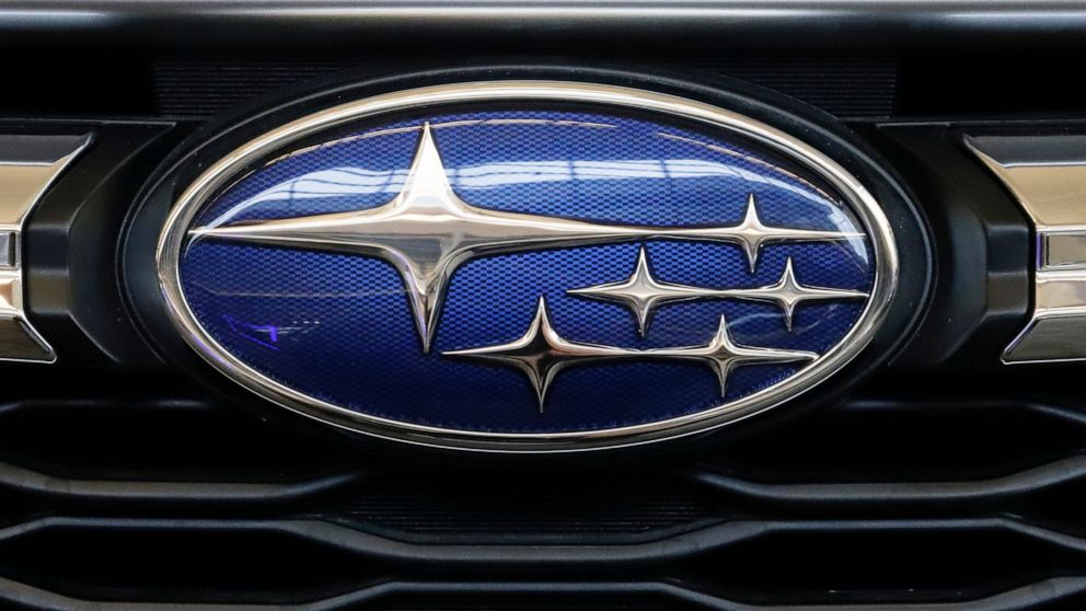 FILE - In this Feb. 14, 2019, file photo the Subaru logo on the front grill of a 2019 Subaru Impreza sedan is displayed at the 2019 Pittsburgh International Auto Show in Pittsburgh. Subaru is recalling just over 200,000 cars and SUVs in the U.S. and 
