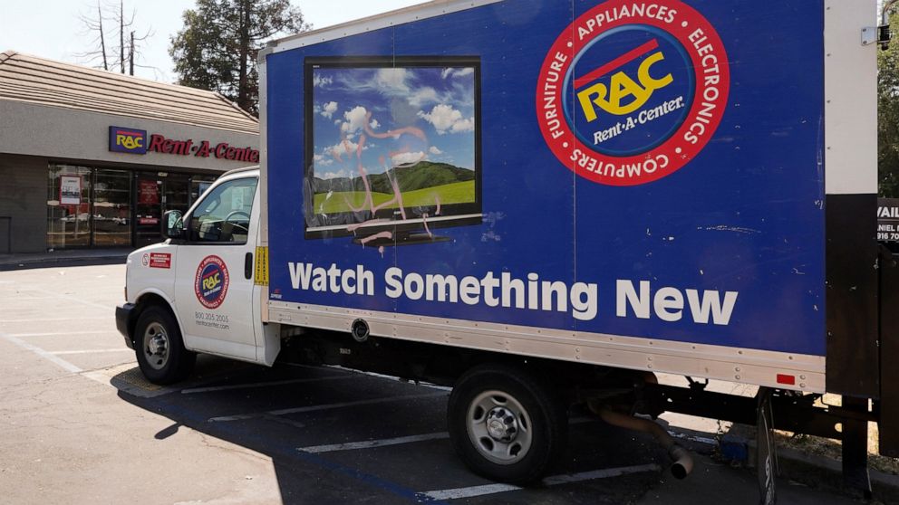 A Rent-A-Center delivery truck is seen in Sacramento, Calif., Tuesday, Aug. 2, 2022. California Attorney General Rob Bonta announced, Tuesday, Aug. 2, 2022, that Rent-A-Center, one of the nation's largest rent-to-own companies will pay $15.5 million 