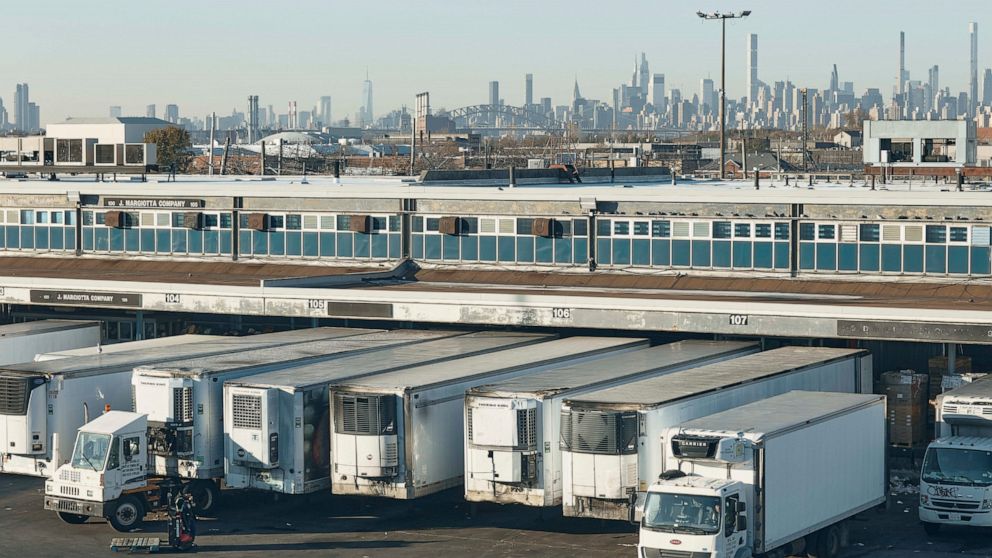 Drivers position their trucks on the loading docks inside the Hunts Point Produce Market on Tuesday, Nov. 22, 2022, in the Bronx borough of New York. Hunts Point's wholesalers distribute 2.5 billion pounds of produce a year, with about 30 million pou