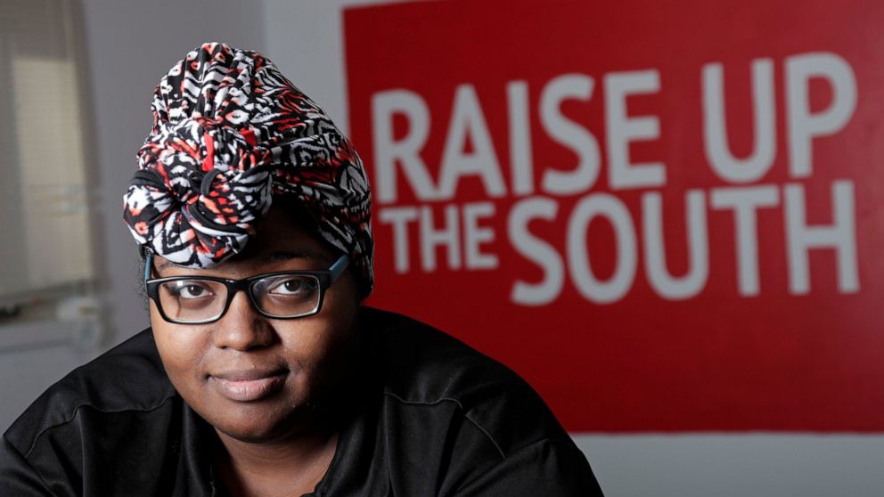Food service worker Sheree Allen poses in the Raise Up offices, a branch of the Fight for $15 union, Thursday, Feb. 10, 2022, in Durham, N.C. After decades of decline, U.S. unions have a new reason for hope: younger workers. Sheree Allen was hoping f