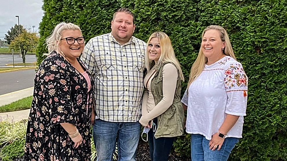 In this photo taken in October 2020, Jennifer Lannon, second from right, poses for a photo with her brother Chris Whitman, second from left, and sisters, Sarah Whitman, far left, and Kim Bermudez in Blackwood, N.J. Lannon's body and three other peopl