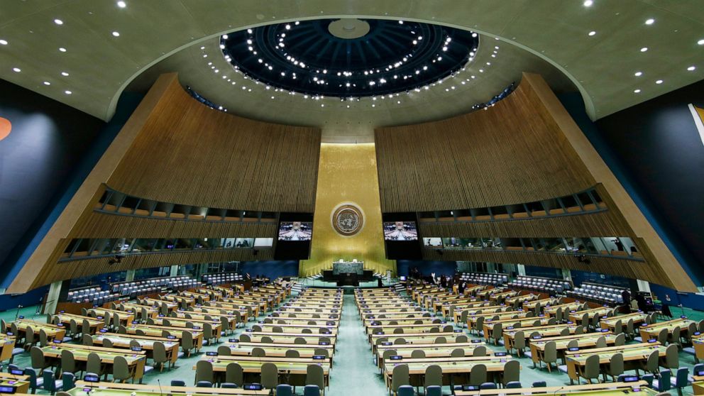 FILE - The United Nations General Assembly Hall sits empty before the start of the 76th Session of the General Assembly at U.N. headquarters on Sept. 20, 2021, in New York. A key U.N. committee has again blocked Myanmar’s military junta from taking t