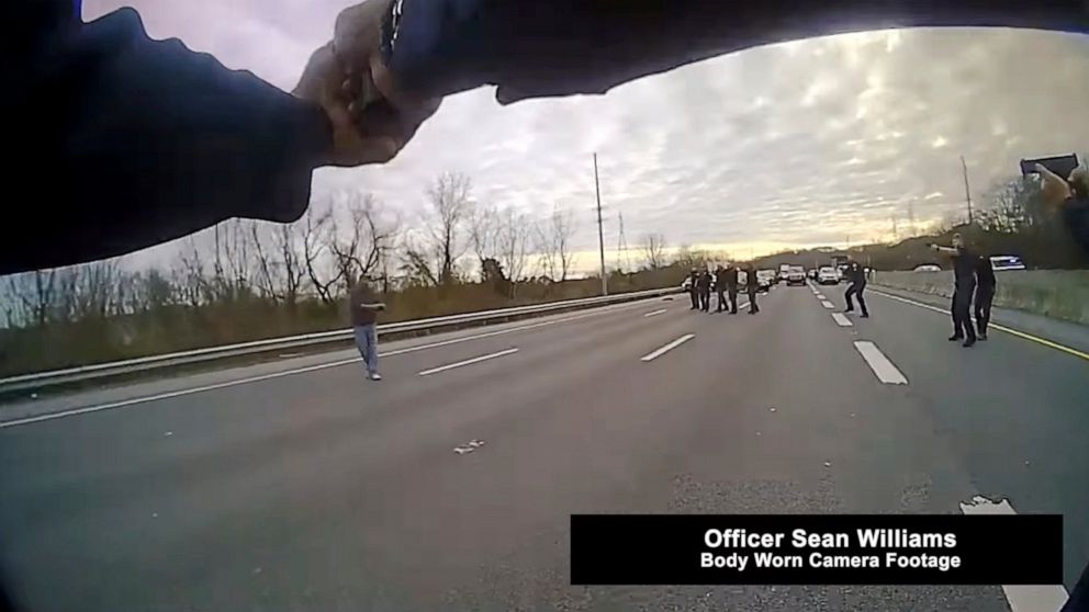 This still image from police body cam released by Metropolitan Nashville Police Department shows officers pleading with a man to surrender before shooting him on Jan. 28, 2022 in Nashville, Tenn. Tennessee police officers repeatedly pleaded with a ma