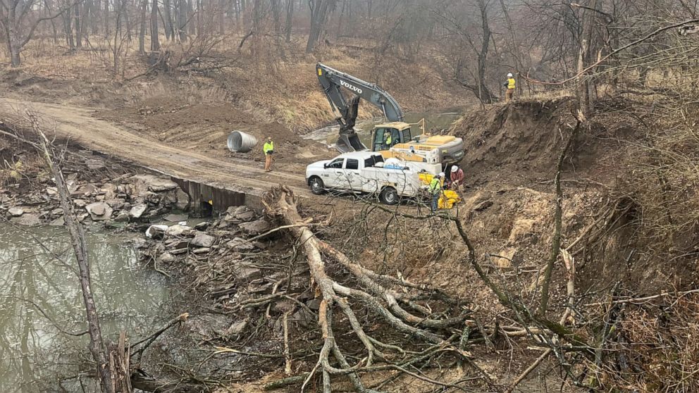 Washington County Road Department constructs an emergency dam to intercept an oil spill after a Keystone pipeline ruptured at Mill Creek in Washington County, Kanas, on Thursday, Dec 8, 2022. Vacuum trucks, booms and an emergency dam were constructed