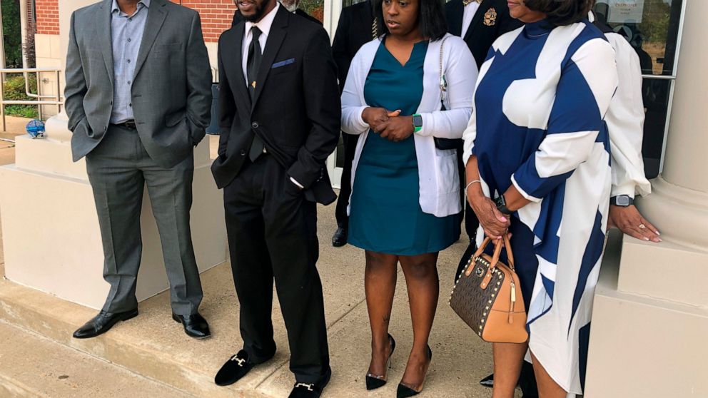 FILE - Brandon Calloway, second from left, speaks with a reporter alongside his family about his violent arrest in July for alleged traffic violations on Oct. 24, 2022, in Somerville, Tenn. Also pictured are Calloway's father, Ed Calloway, left, sist