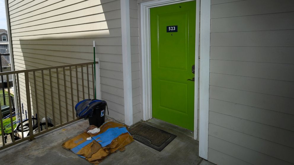 The front door of an apartment residence of former U.S. Marine Willy Joesph Cancel is shown Friday, April 29, 2022, in Murray, Ky. Relatives say Cancel has been killed alongside Ukrainian forces in the war with Russia in what’s the first known death 