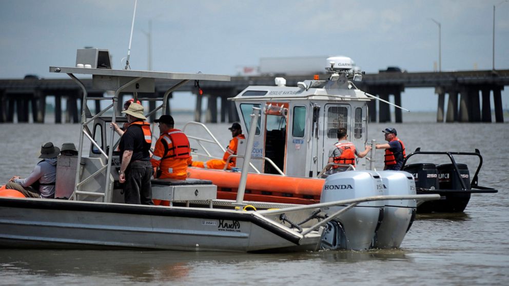 FILE - Crew members leave Mobile, Ala., on their way to the wreck of the last U.S. slave ship, the Clotilda, on May 2, 2020. Descendants of the last African people abducted into slavery and brought to American shores gathered on July 9, 2022, on the