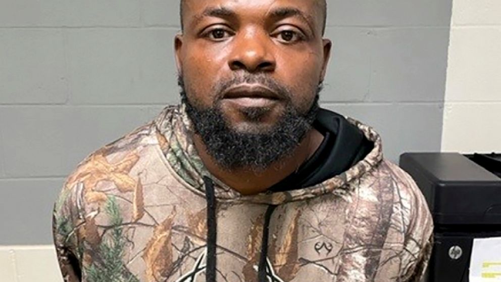 In this photo released by Georgia Department of Public Safety, Damien Ferguson is photographed after he was apprehended Sunday, Oct. 10, 2021, in Alamo, Ga. Ferguson is accused of gunning down a Georgia police officer during his first shift with the 