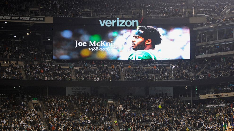 FILE - A monitor shows an image of former New York Jets player Joe McKnight, who was killed on Dec. 1, 2016, during a moment of silence prior to an NFL football game between the New York Jets and the Indianapolis Colts on Dec. 5, 2016, in East Ruther