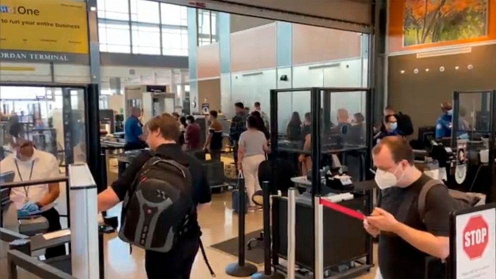Travelers line up at a TSA screening area at Austin-Bergstrom International Airport in Austin, Texas on Wednesday, Sept. 7, 2022. An early morning power outage at the airport caused flight delays that continued even after electricity was restored. Th