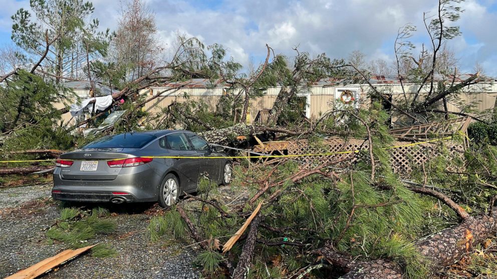 A damaged mobile home where two people died is seen, in Flatwood, Ala. on Wednesday, Nov. 30, 2022. Tornadoes damaged numerous homes, destroyed a fire station, briefly trapped people in a grocery store and ripped the roof off an apartment complex in 