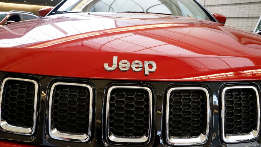 FILE - A 2019 Jeep Compass is seen on display at the 2019 Pittsburgh International Auto Show in Pittsburgh on Feb. 14, 2019. U.S. safety regulators are investigating complaints that the engines on some small Jeeps can shut down while being driven. (A