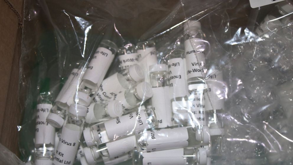 In this Thursday, March 12, 2020, photo released by the U.S. Customs and Border Protection (CBP), shows a package containing suspected counterfeit COVID-19 test kits arriving from the United Kingdom. CBP officers discovered six plastic bags containin