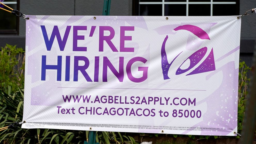 A hiring sign is displayed outside of a restaurant during the COVID-19 pandemic in Glenview, Ill., Saturday, May 8, 2021. US job growth slows sharply in sign of hiring struggles. Employers added just 266,000 jobs in April, sharply lower than in March
