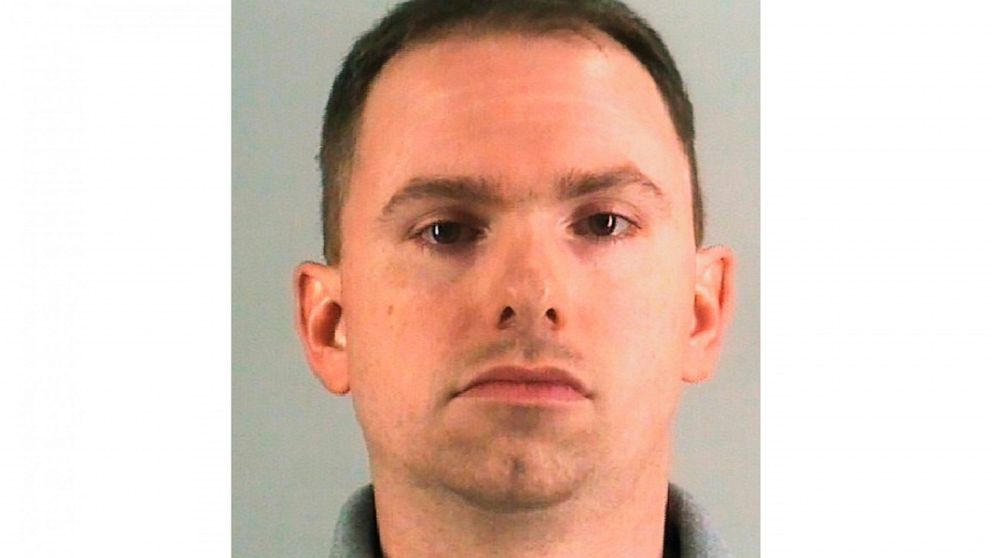 FILE - This undated photo provided by the Tarrant County Jail shows Aaron Dean. A date has been set for the trial of Dean, a former Fort Worth police officer who was charged with murder after shooting a Black woman through a back window of her home w