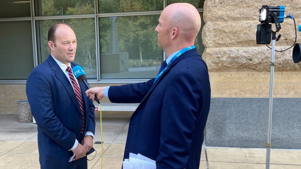 A reporter interviews acting U.S. Attorney Jonathan Lenzner outside the federal courthouse in Greenbelt, Md., on Wednesday, Sept. 15, 2021, after a judge sentenced Eric Eoin Marques to 27 years in prison. U.S. authorities have said Marques, 36, was t