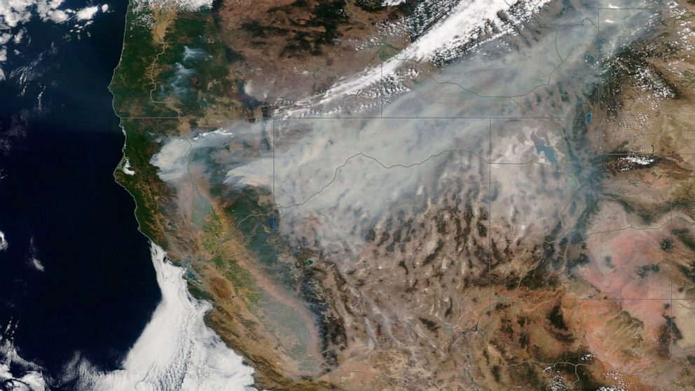 In this satellite image provided by Maxar Technologies the Dixie Fire burns in Northern California on Sunday, Aug. 8, 2021. (Satellite image ©2021 Maxar Technologies via AP)