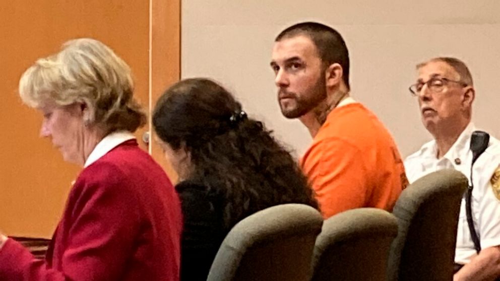 Adam Montgomery, with defense attorneys Caroline Smith, far left, and Paige Pihl-Buckley listens during a hearing on Wednesday, Sept. 28, 2022, in Manchester, N.H. He is charged with assaulting his daughter, Harmony Montgomery, who disappeared in 201