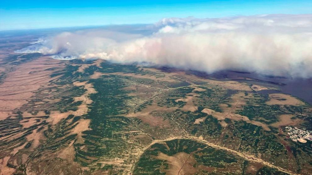This Friday, June 10, 2022, aerial photo provided by the Bureau of Land Management Alaska Fire Service shows a tundra fire burning near the community of St. Mary's, Alaska. The largest documented wildfire burning through tundra in southwest Alaska wa