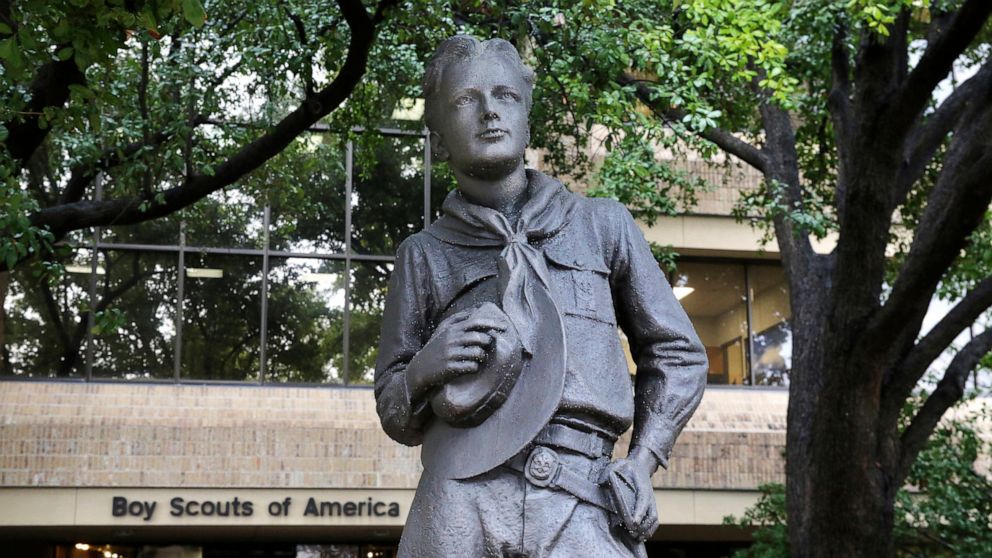 In this Feb. 12, 2020, photo, a statue stands outside the Boys Scouts of America headquarters in Irving, Texas. Some victims of childhood sex abuse who are considering suing the Boy Scouts of America must rush to do so or perhaps face a greater risk 