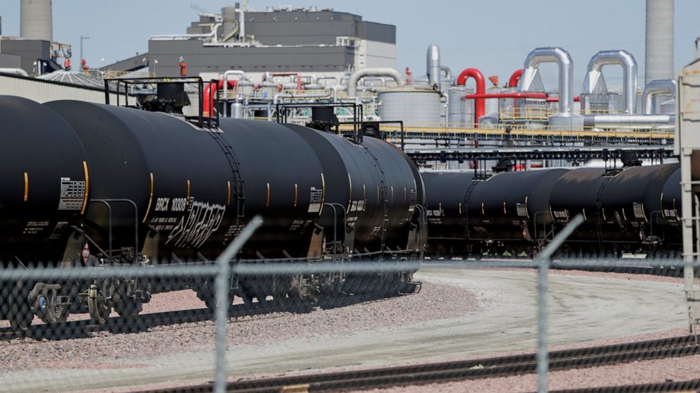 FILE - In this April 21, 2020 file photo, ethanol train cars wait outside the Southwest Iowa Renewable Energy plant, an ethanol producer, in Council Bluffs, Iowa. A federal appeals court on Friday, July 2, 2021, threw out a Trump-era Environmental Pr