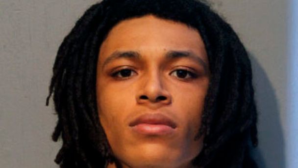 This undated booking photo provided by the Chicago Police Department shows Eric Morgan, one of two brothers who have been charged in a weekend shooting during a traffic stop that left one Chicago police officer dead and another seriously wounded. (Ch