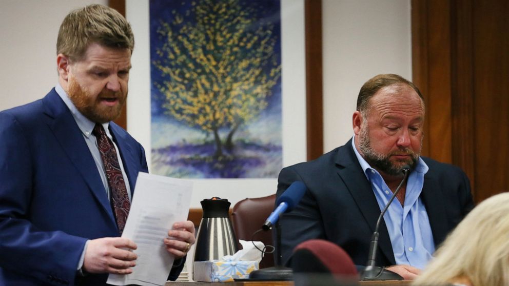Mark Bankston, lawyer for Neil Heslin and Scarlett Lewis, asks Alex Jones questions about text messages during trial at the Travis County Courthouse in Austin, Wednesday Aug. 3, 2022. Jones testified Wednesday that he now understands it was irrespons