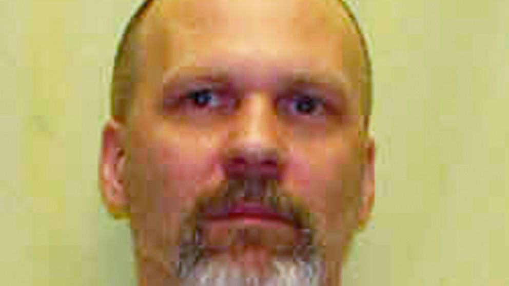 This undated photo provided by the Ohio Department of Rehabilitation and Correction shows Warren Keith Henness. The Ohio man sentenced to death in the fatal shooting of a volunteer addiction counselor is proclaiming his innocence and asking that his 