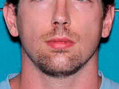 4 charged after burning body found in rural Iowa ditch