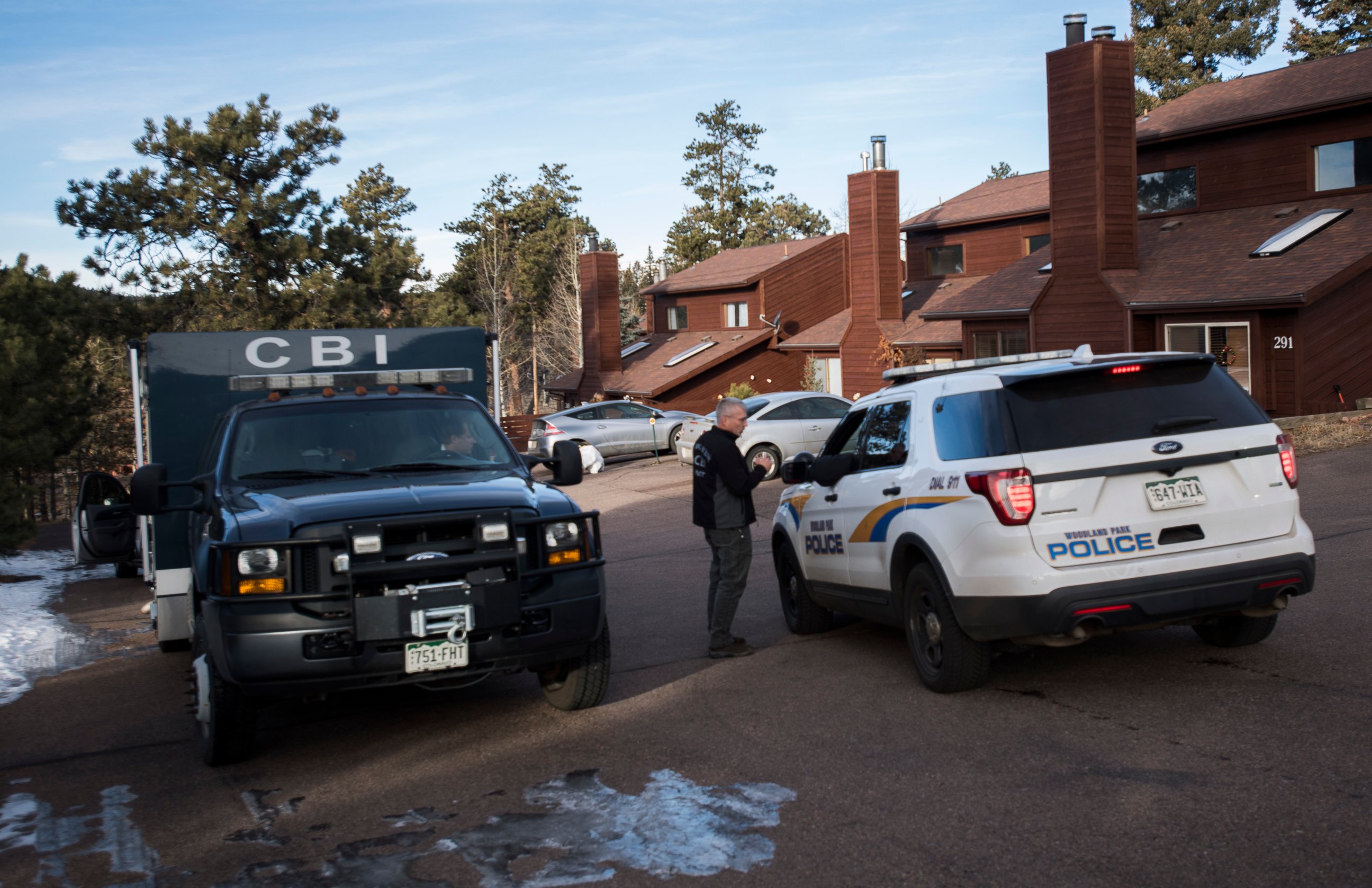 Members of the Colorado Bureau of Investigation and the Woodland Park, Colo., Police arrive Friday, Dec. 21, 2018, at the home of Kelsey Berreth, who has been missing since Thanksgiving. Police arrested her fiance Patrick Frazee earlier in the mornin